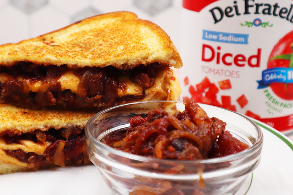Image of our Bacon Bruschetta Recipe on a Grilled Cheese Sandwich