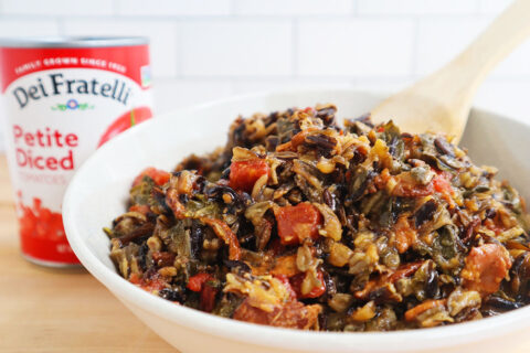 Image of our Wild Rice Salad with Bacon and Tomatoes recipe in a white bowl