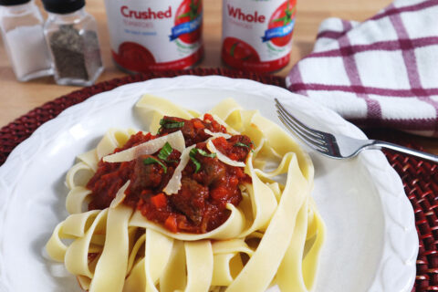 Image of our 1 hour Lamb Ragu recipe on a white plate.